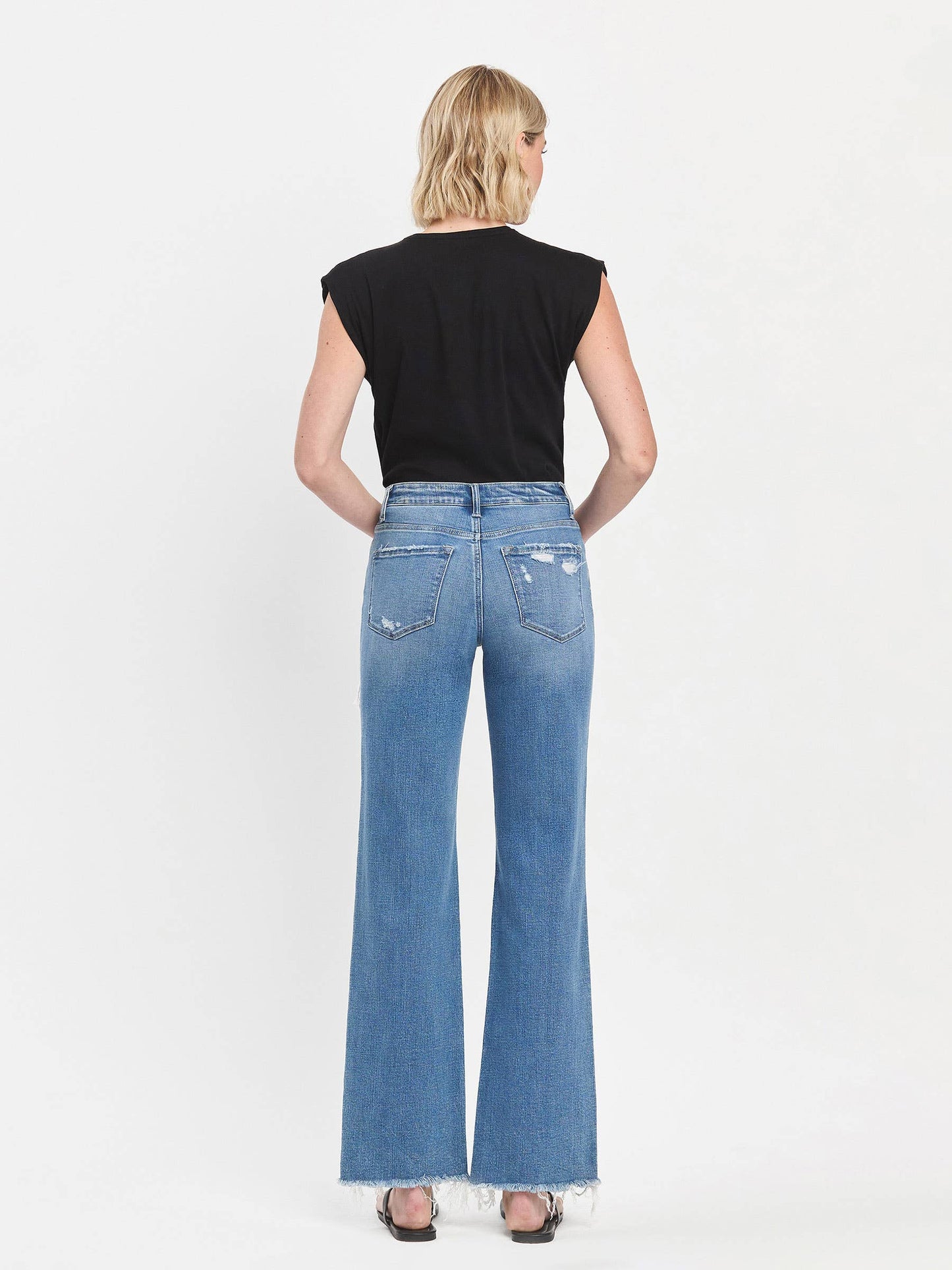 ALIYAH HIGH RISE MEDIUM WASH DISTRESSED SLIM WIDE JEANS