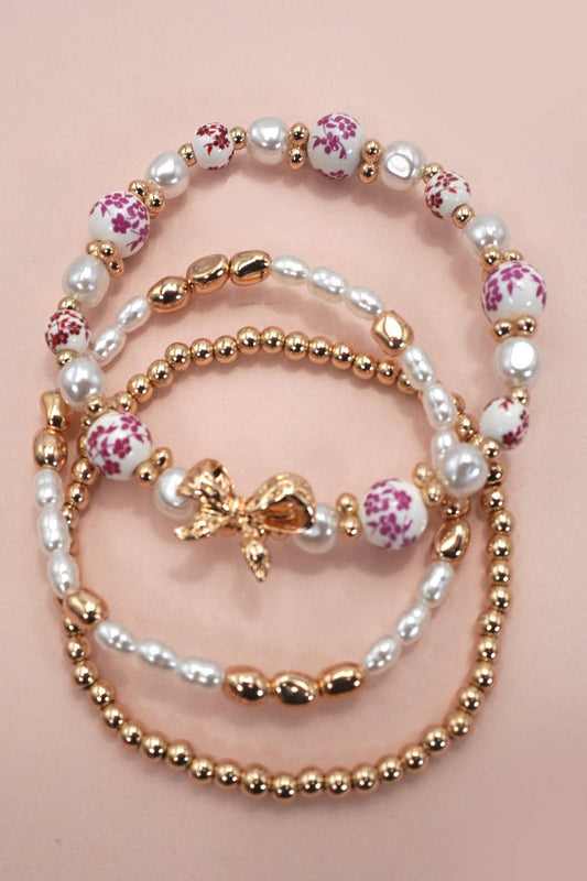 PINK CERAMIC PORCELAIN BOW MULTI LAYER BRACELET | 80B1340