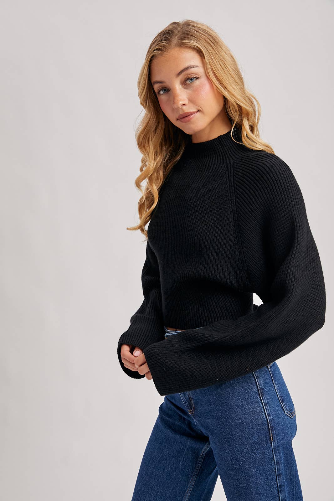 OPEN BACK TIE SWEATER